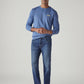 Men's 555 Indigo Relaxed Straight Fit Mid Rise Performance Jeans - Styleshot View
