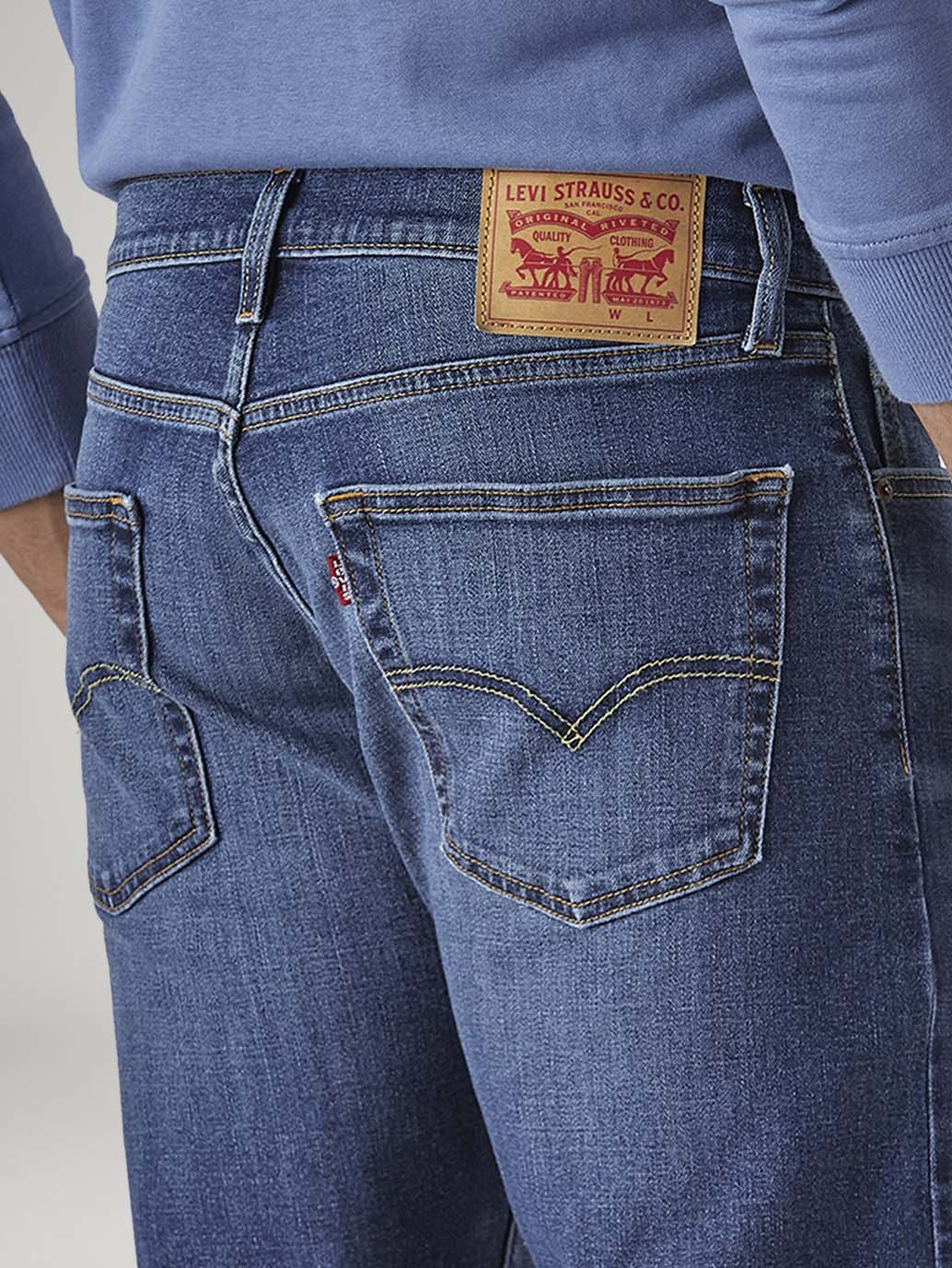 Men's 555 Indigo Relaxed Straight Fit Mid Rise Performance Jeans - Detail View
