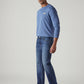 Men's 555 Indigo Relaxed Straight Fit Mid Rise Performance Jeans - Side View