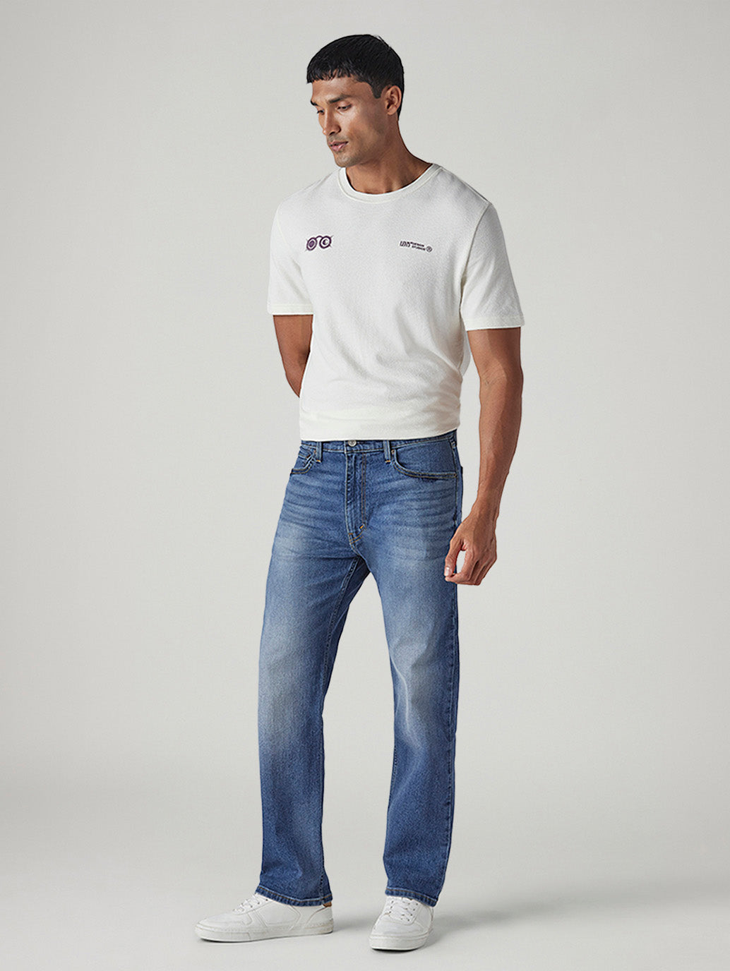 Men's 555 Blue Relaxed Straight Fit Mid Rise Performance Jeans - Side View