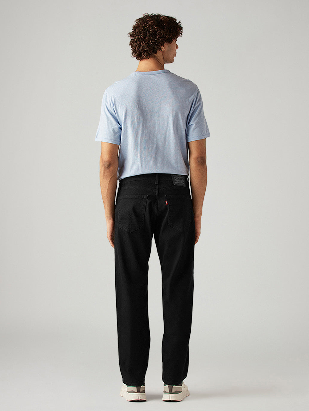 Men's 555 Black Relaxed Straight Fit Mid Rise Jeans - Back View