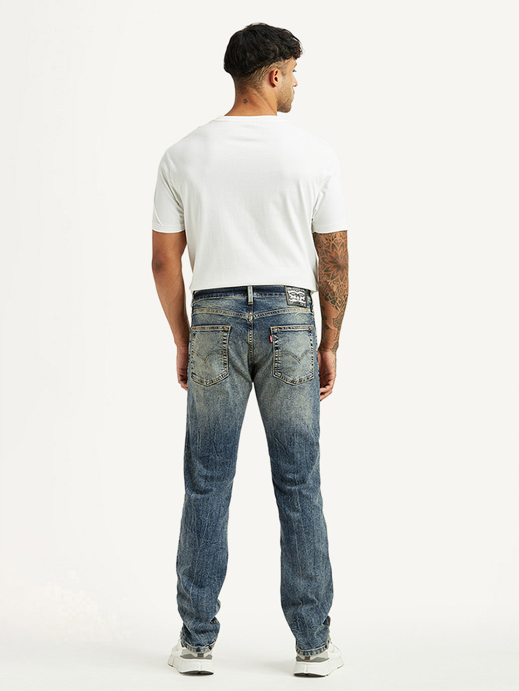 Men's Tinted 513 Blue Slim Tapered Fit Mid Rise Jeans - Back View