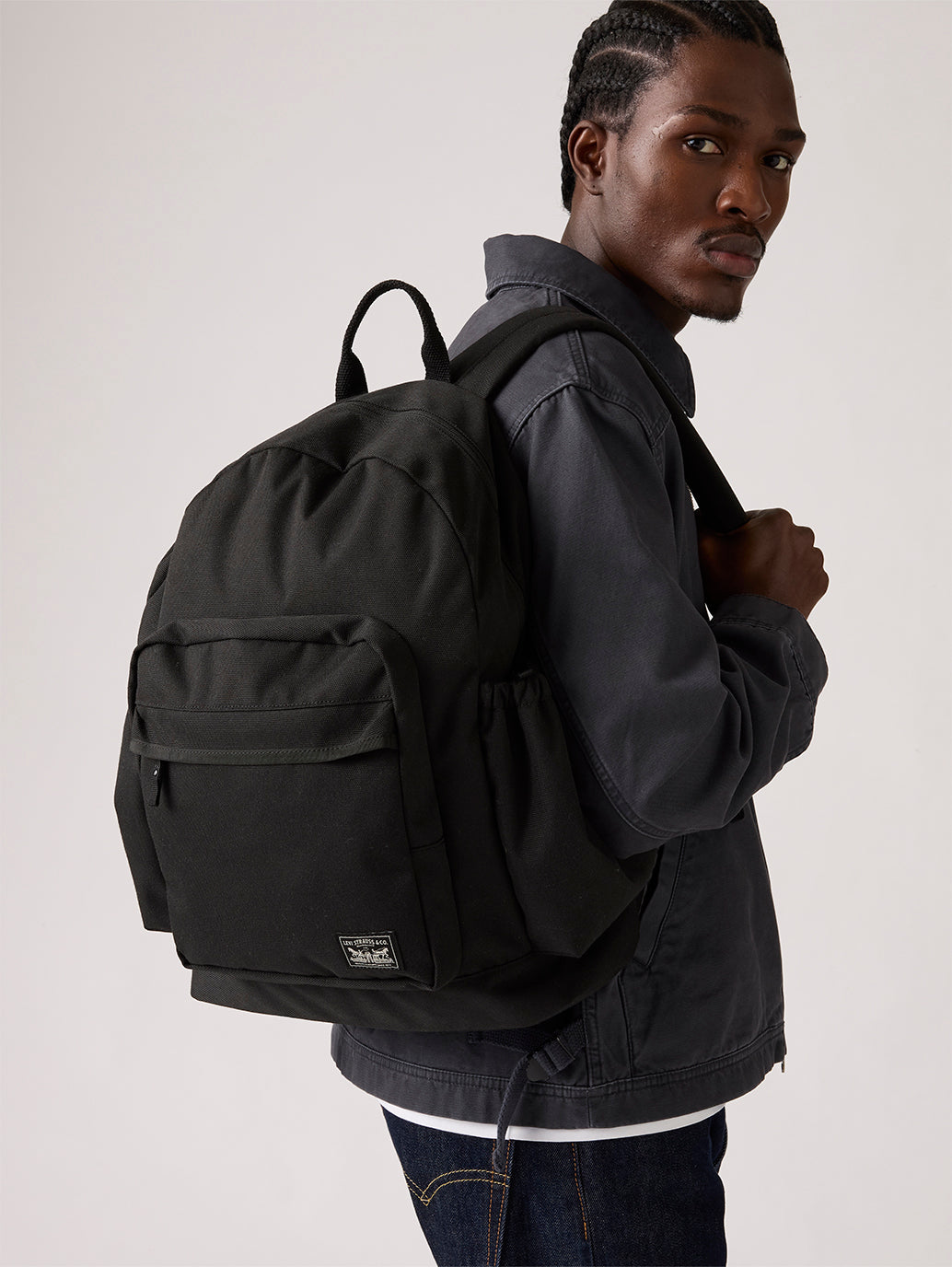 Unisex Black Solid Backpack - Styleshot View