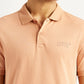 Men's Solid Peach Slim Fit Polo T-shirt - Detail View
