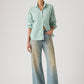 Women's Tinted Med Indigo Loose Bootcut Fit Mid Rise Jeans - Styleshot View