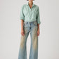 Women's Tinted Med Indigo Loose Bootcut Fit Mid Rise Jeans - Front View