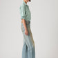 Women's Tinted Med Indigo Loose Bootcut Fit Mid Rise Jeans - Side View