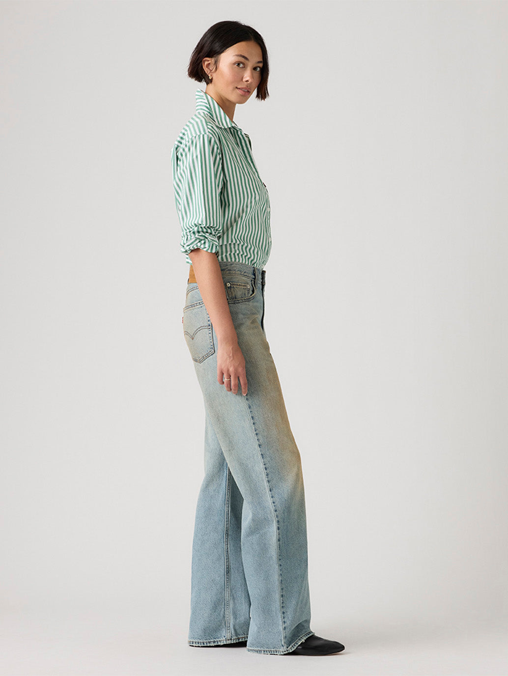 Women's Tinted Med Indigo Loose Bootcut Fit Mid Rise Jeans - Side View