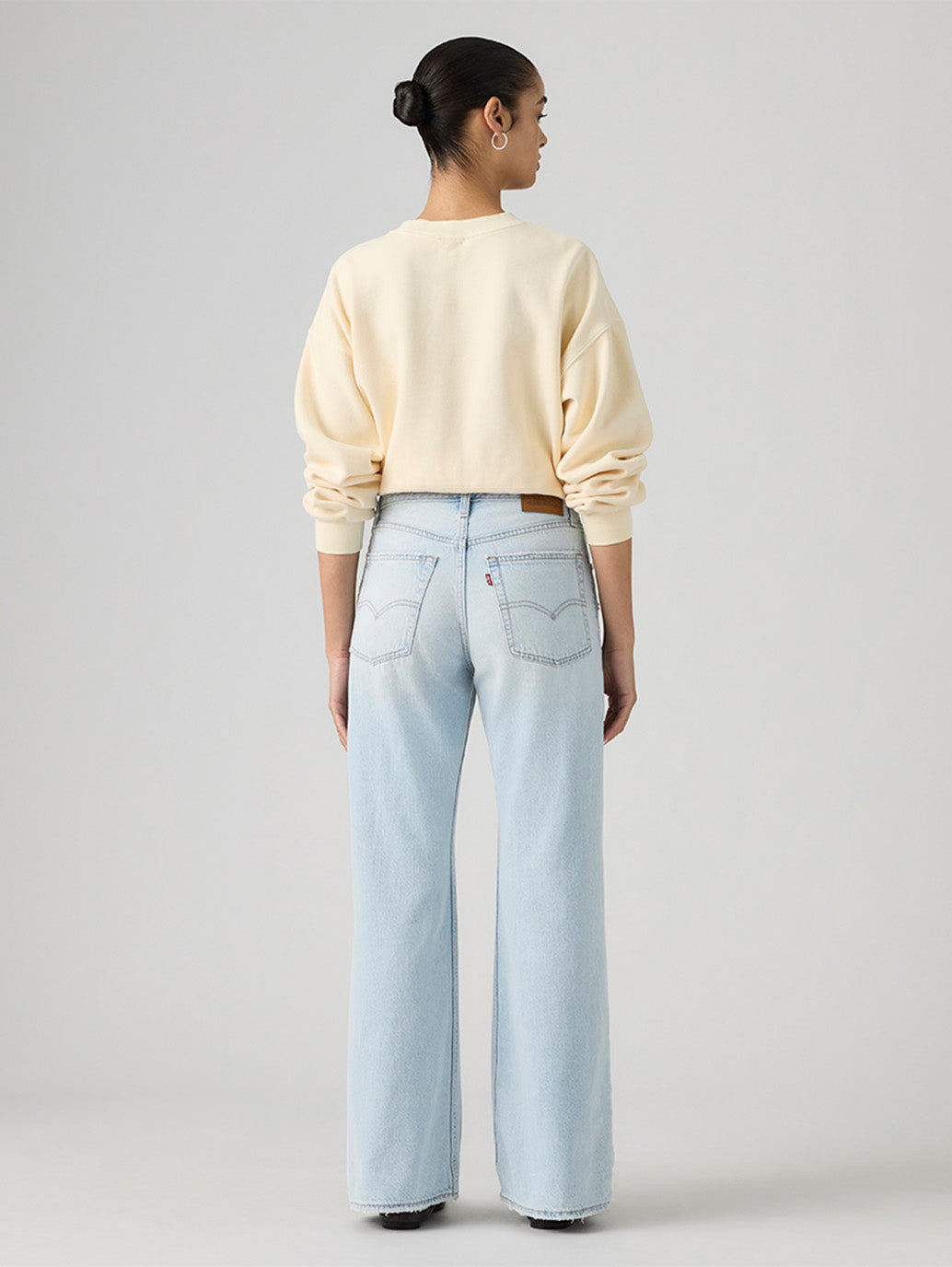 Women's Med Indigo Loose Bootcut Fit Mid Rise Jeans - Back View