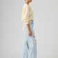 Women's Med Indigo Loose Bootcut Fit Mid Rise Jeans - Side View