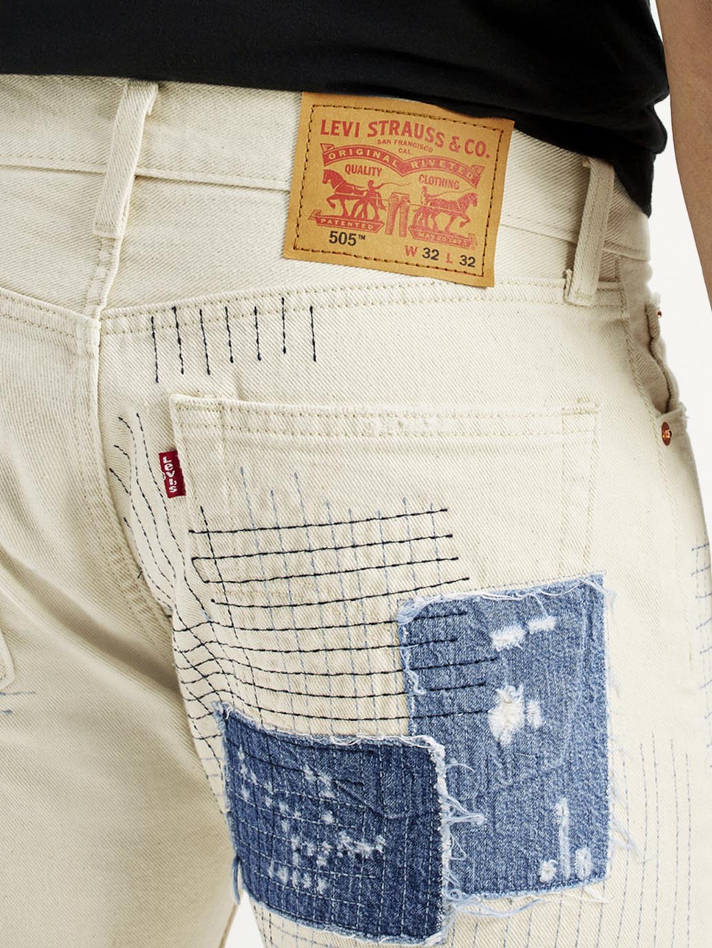 Men's 555 Off White Loose Fit Mid Rise Jeans - Detail View