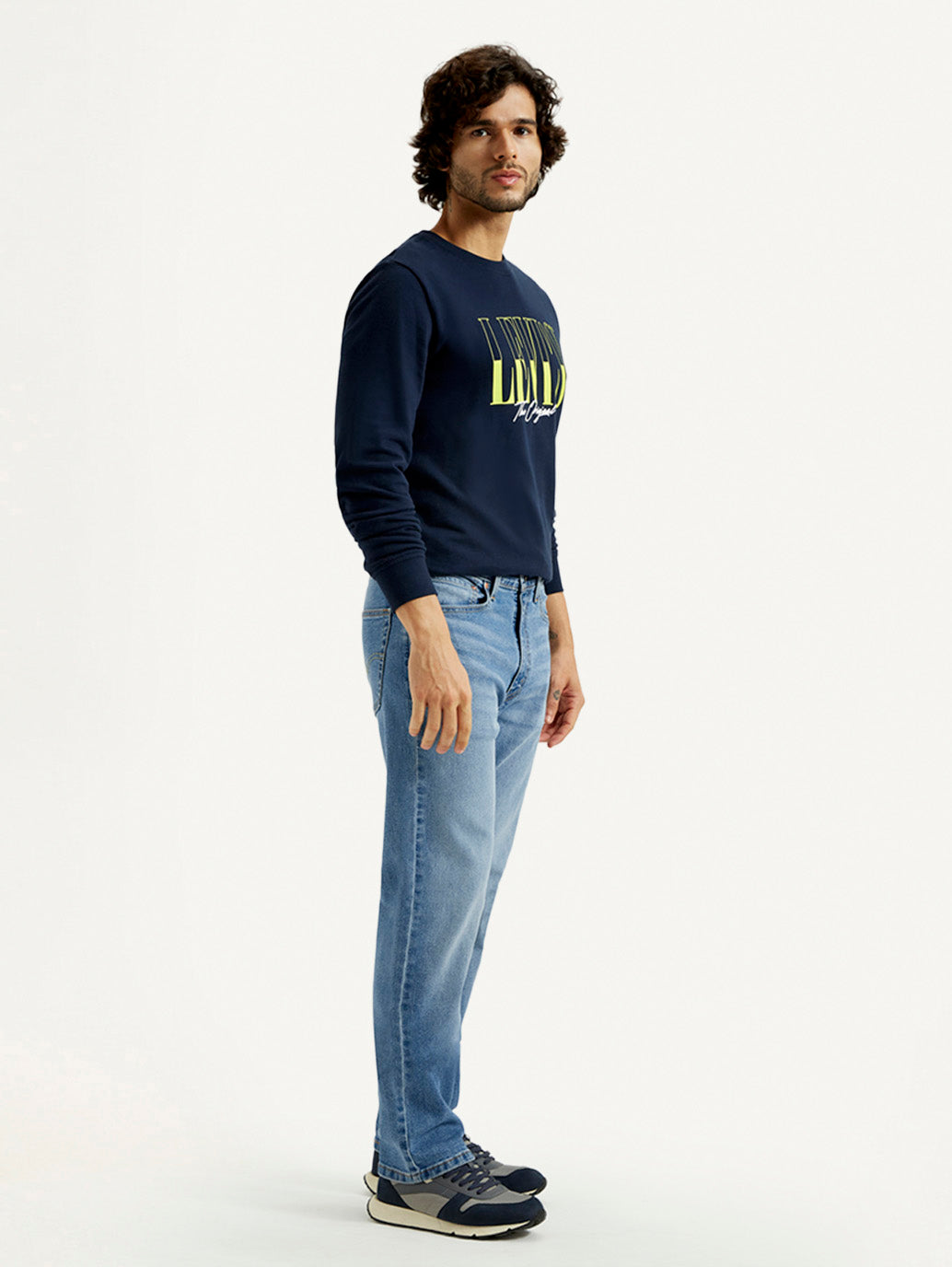Men's 555 Med Indigo Loose Fit Mid Rise Jeans - Side View