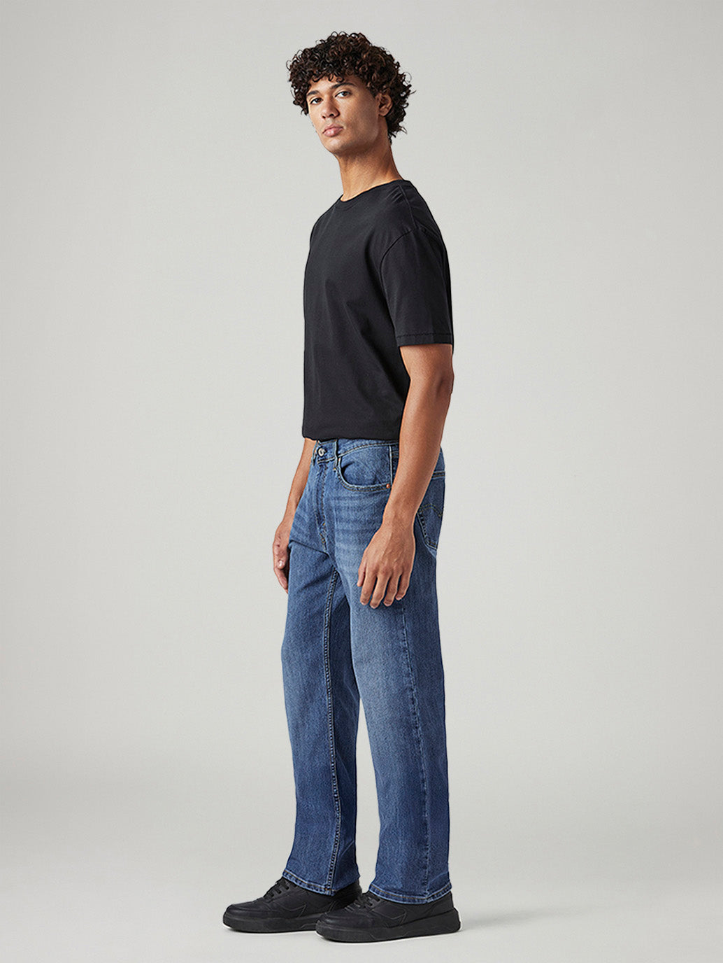Men's 555 Blue Relaxed Straight Fit Mid Rise Jeans - Side View