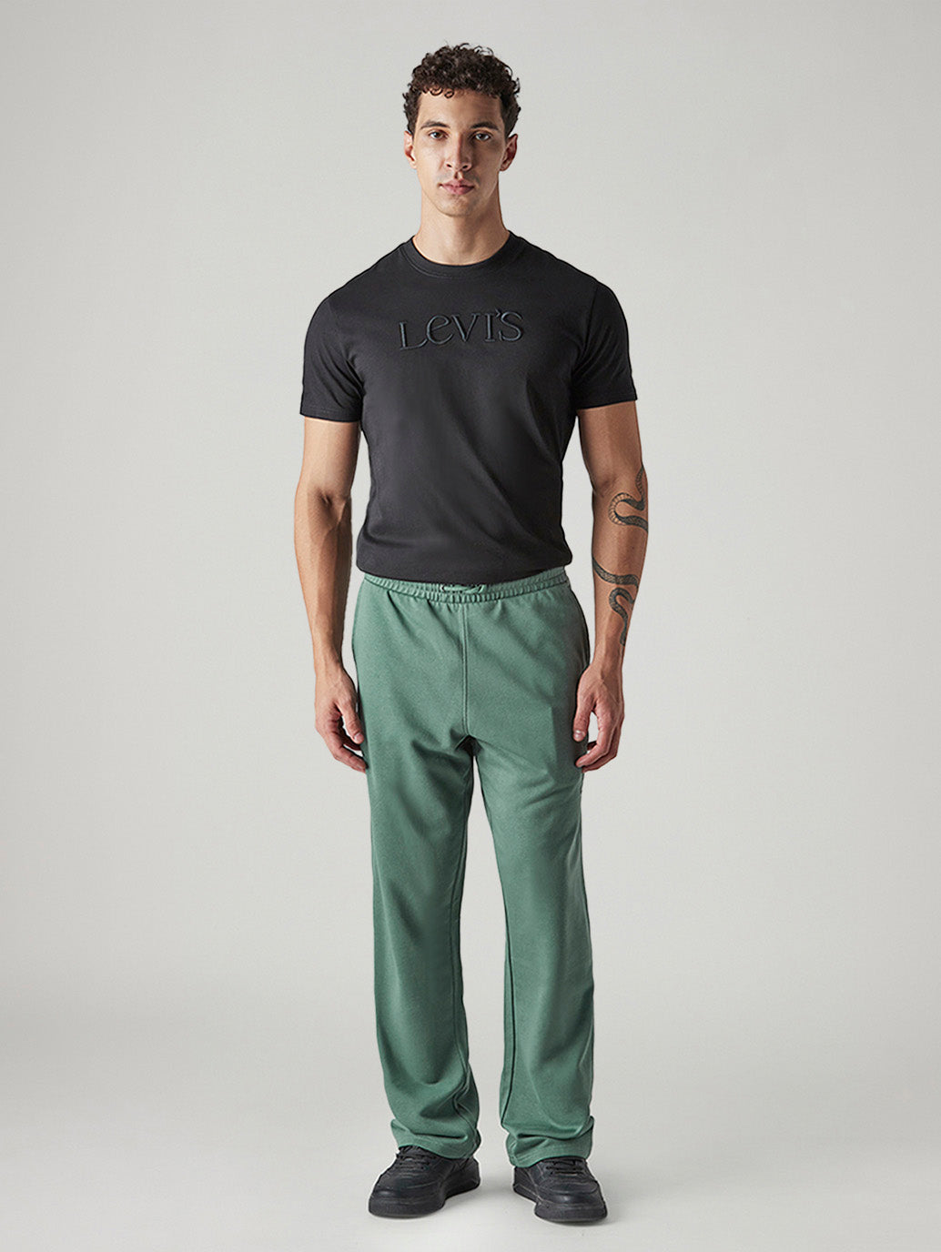 Men's Green Regular Fit Mid Rise Joggers - Front View