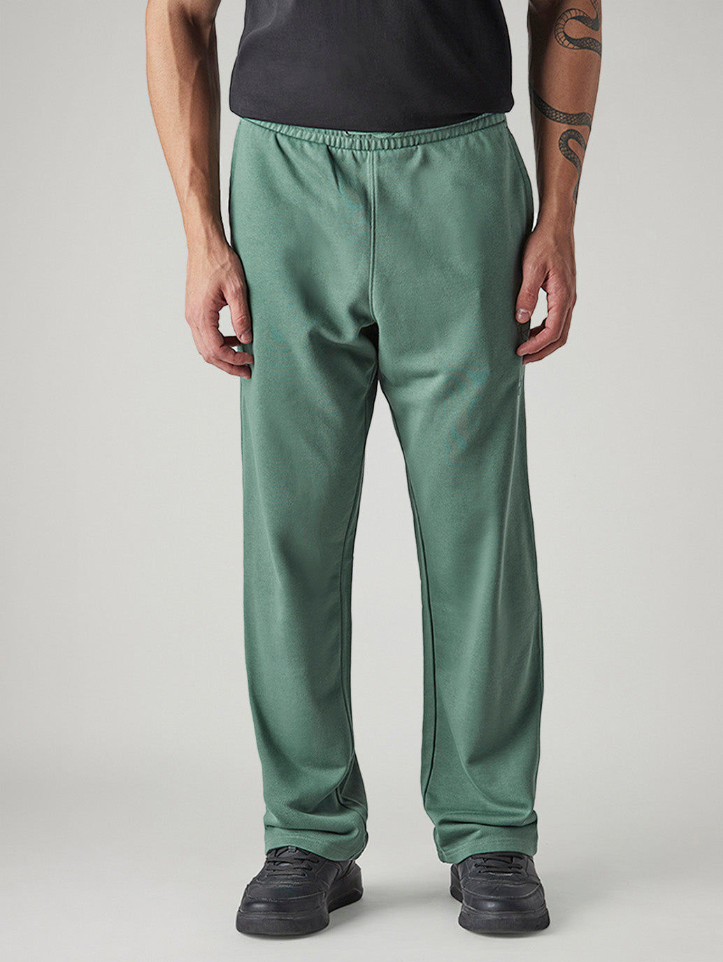 Men's Green Regular Fit Mid Rise Joggers - Front View