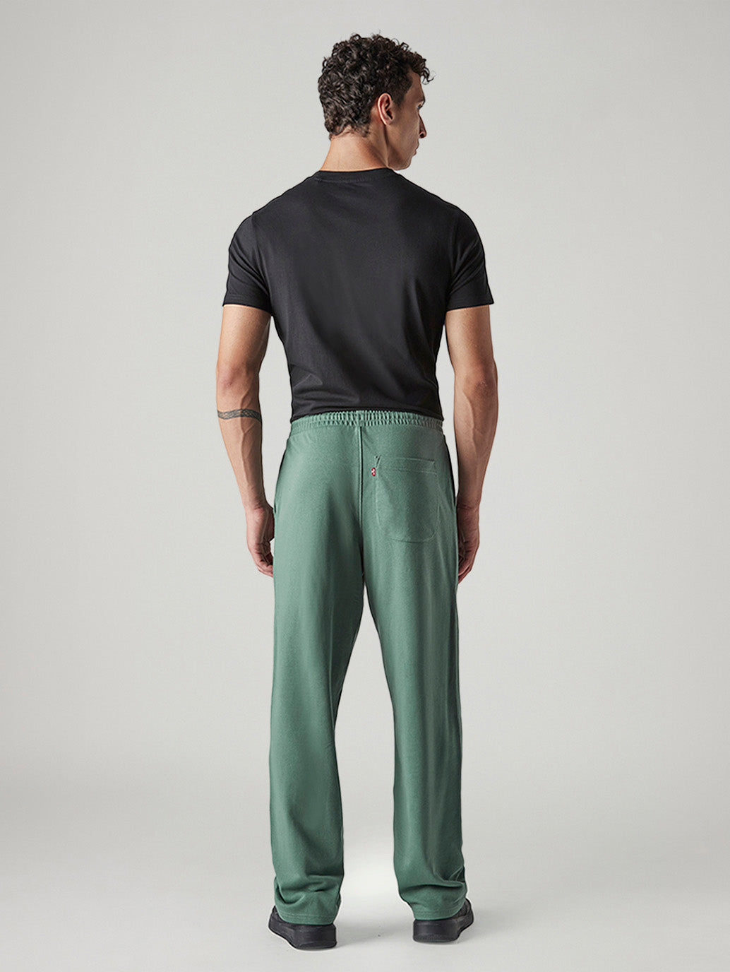 Men's Green Regular Fit Mid Rise Joggers - Back View
