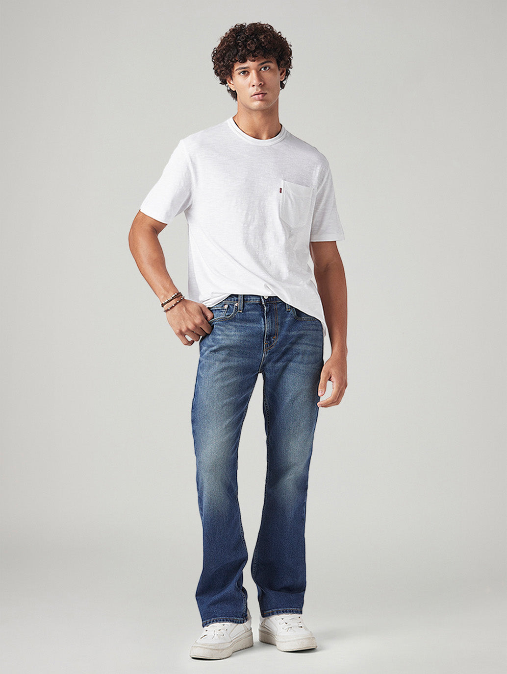 Men's 527 Med Indigo Bootcut Fit Mid Rise Tinted Jeans - Styleshot View