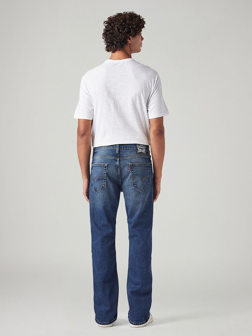 Men's 527 Med Indigo Bootcut Fit Mid Rise Tinted Jeans - Back View
