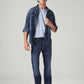 Men's 527 Med Indigo Bootcut Fit Mid Rise Tinted Jeans - Styleshot View