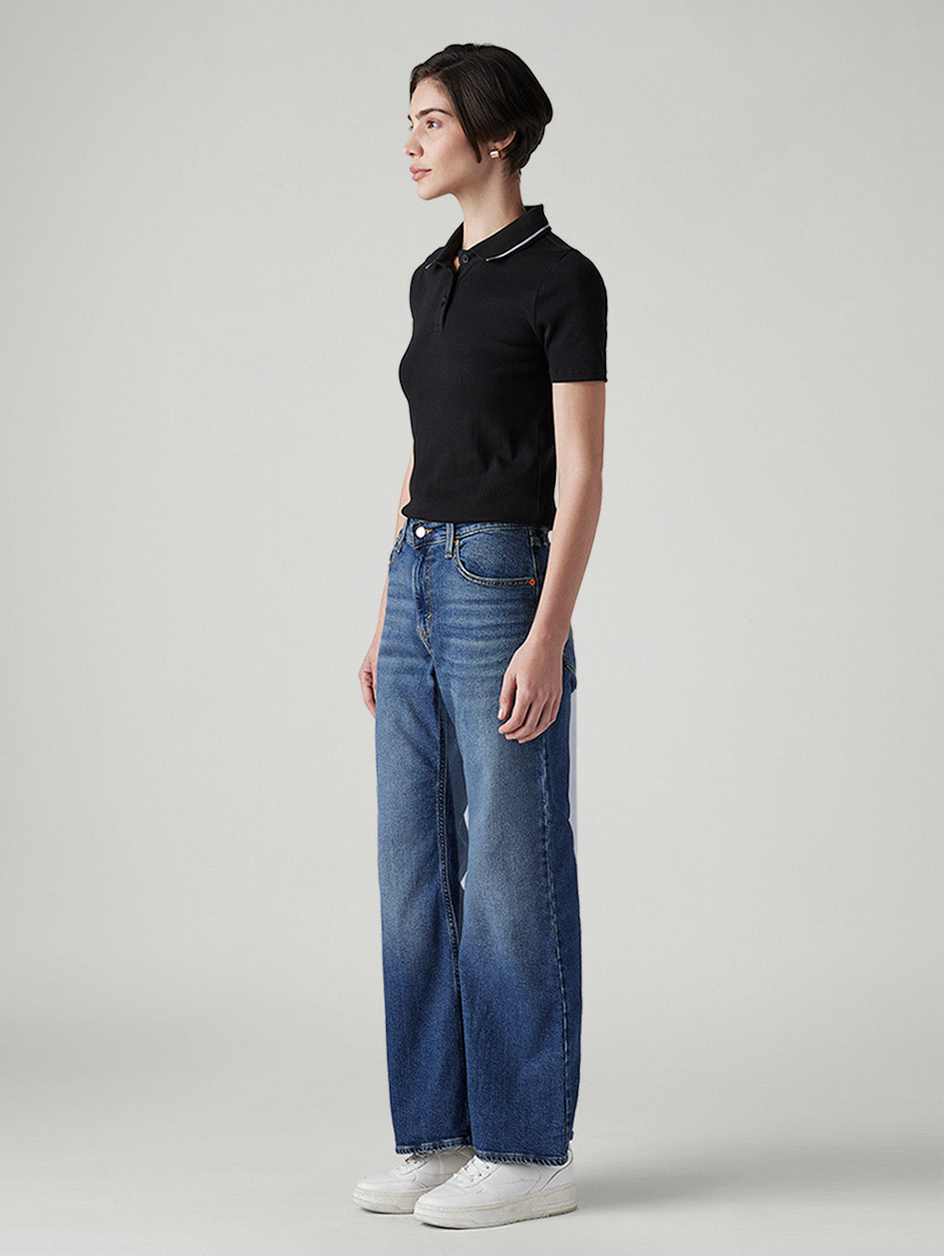 Women's Dark Indigo Loose Bootcut Fit Mid Rise Jeans - Side View