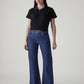 Women's Med Indigo Loose Bootcut Fit Mid Rise Jeans - Front View
