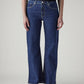 Women's Med Indigo Loose Bootcut Fit Mid Rise Jeans - Front View