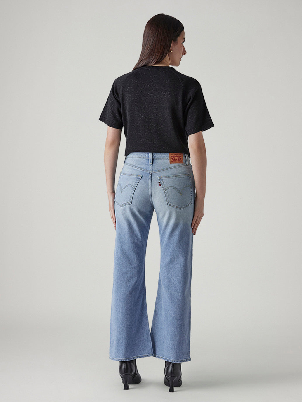 Women's Light Indigo Loose Bootcut Fit Mid Rise Jeans - Back View