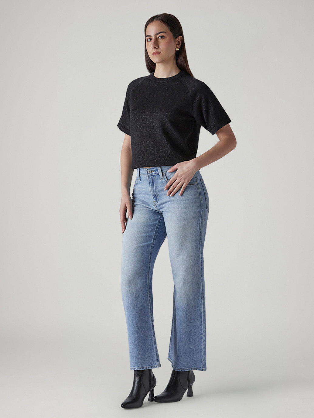 Women's Light Indigo Loose Bootcut Fit Mid Rise Jeans - Side View