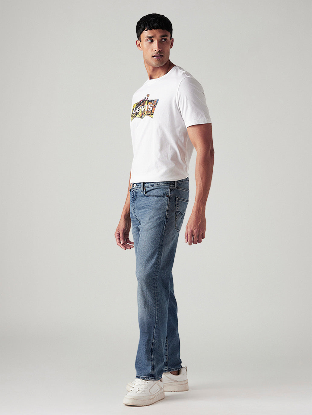 Men's 555 Blue Relaxed Straight Fit Mid Rise Commuter Jeans - Side View