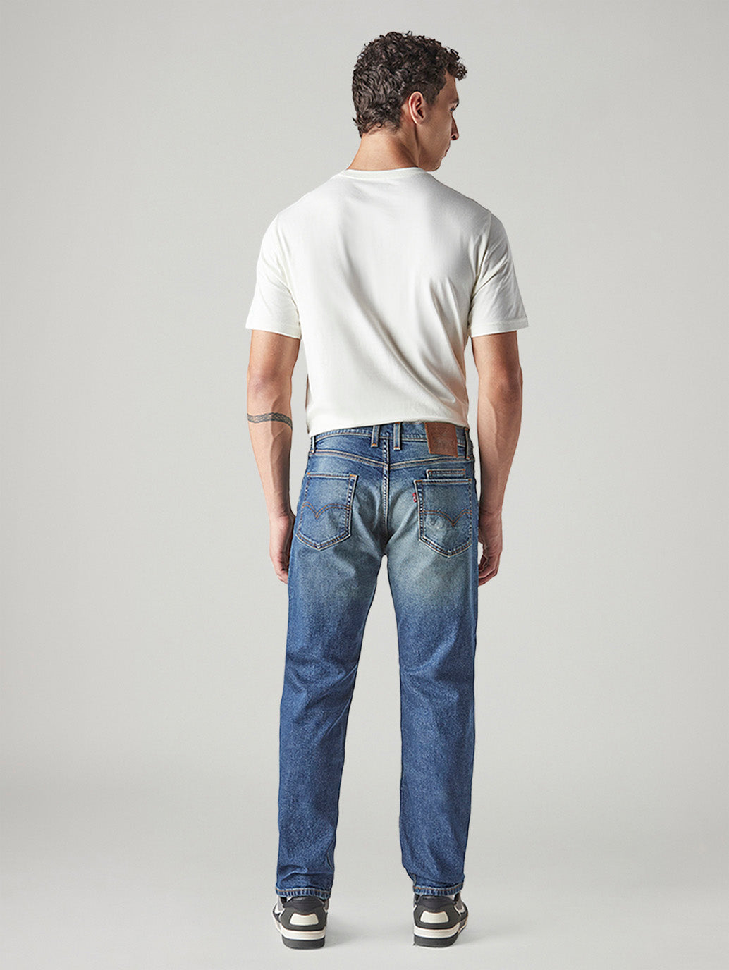 Men's 555 Tinted Dark Indigo Relaxed Straight Fit Mid Rise Jeans - Back View
