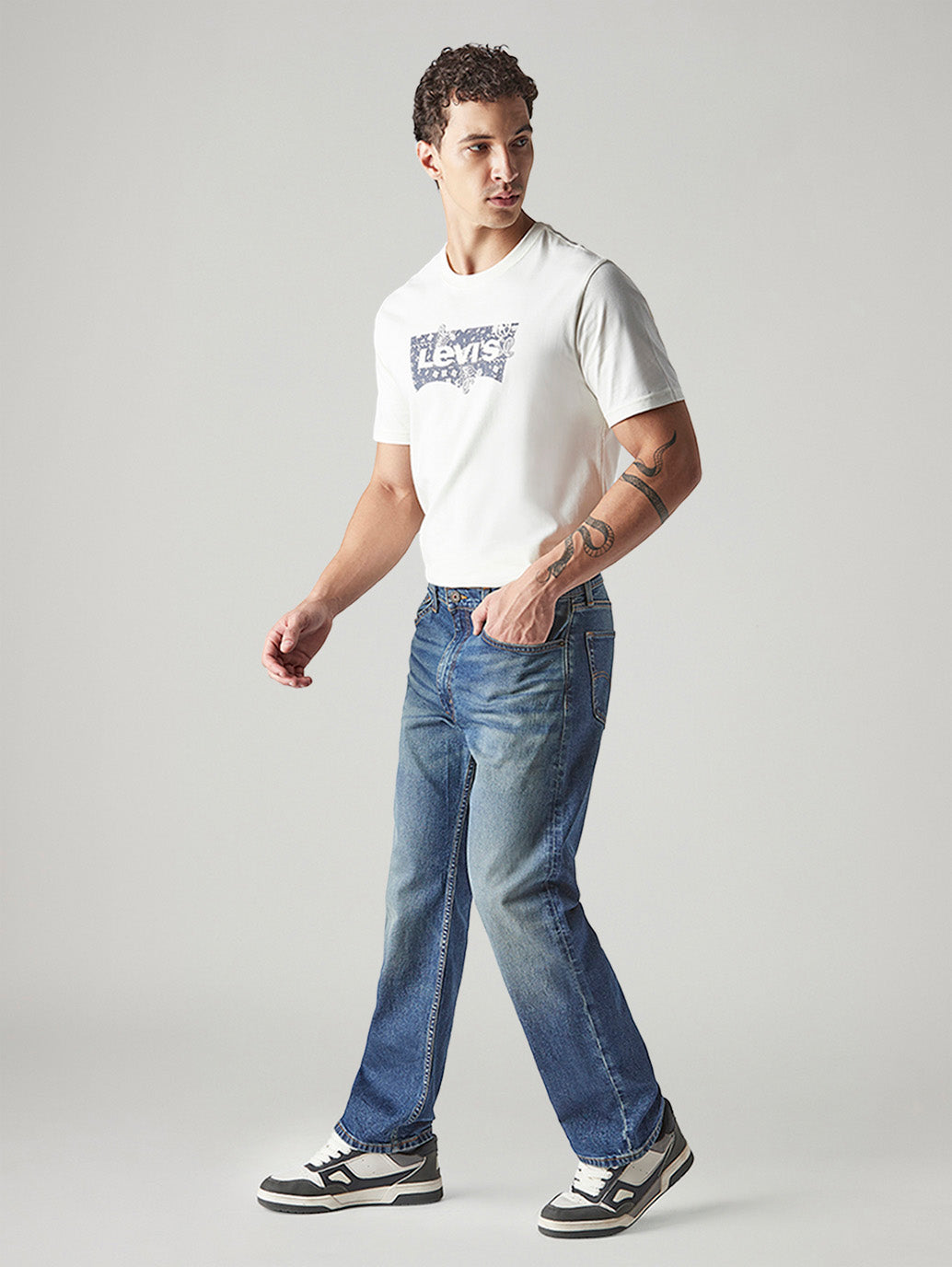 Men's 555 Tinted Dark Indigo Relaxed Straight Fit Mid Rise Jeans - Side View
