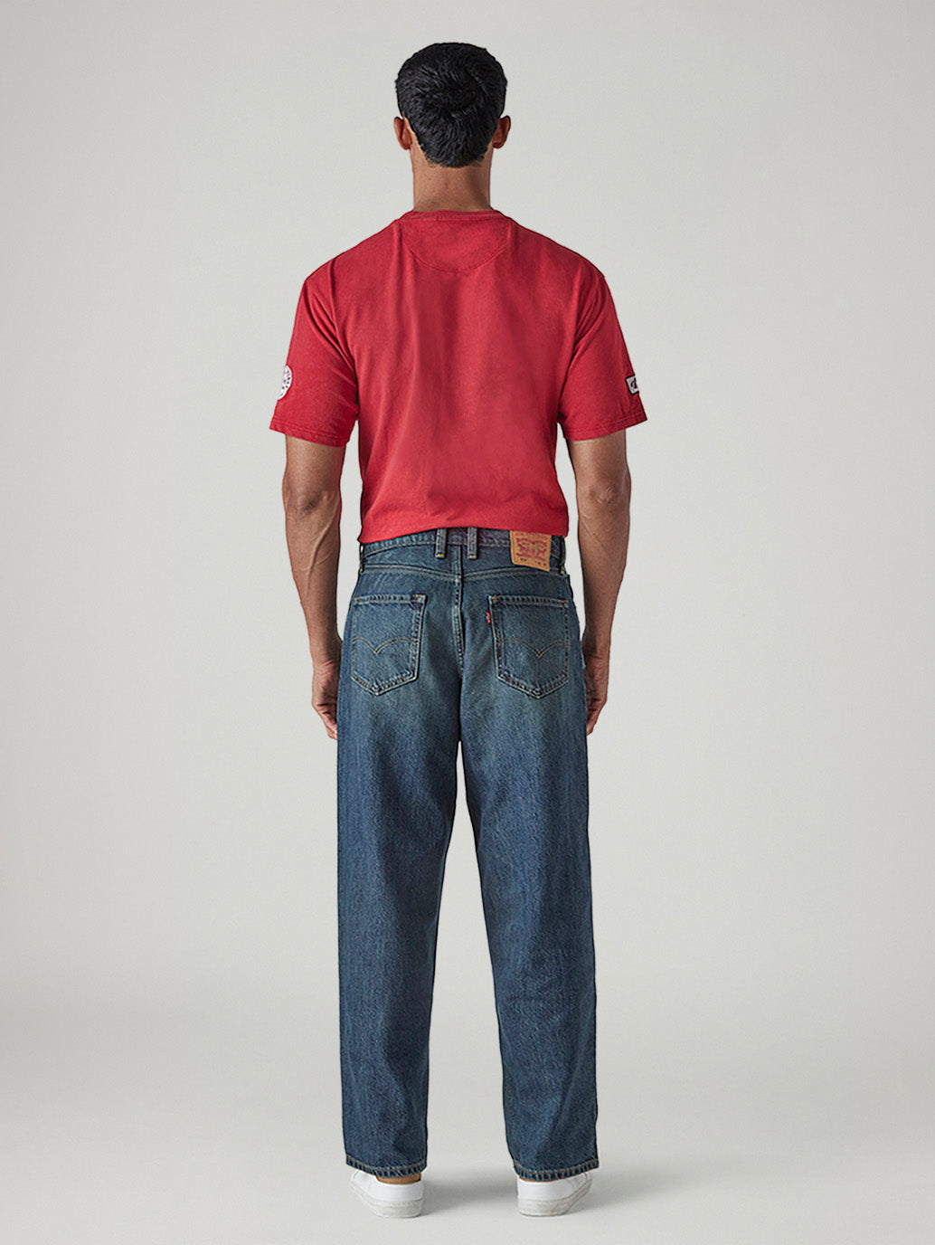 Men's Tinted 568 Dark Indigo Loose Fit Mid Rise Jeans - Back View