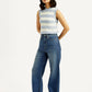 Women's Med Indigo Loose Fit High Rise Jeans - Side View