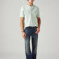 Men's 541 Dark Indigo Athletic Tapered Fit Mid Rise Selvedge Jeans - Styleshot View